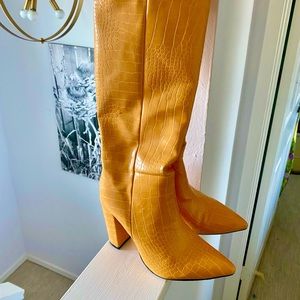Mustard color knee high heeled pull on boots